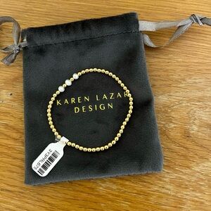 Karen Lazar Pearl and Gold Bead Bracelet.